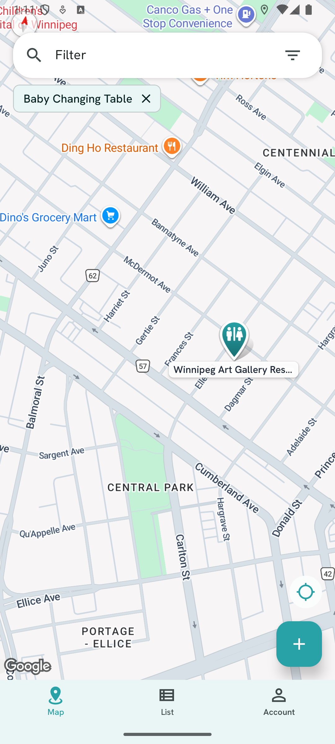 The Tinklestop app on a phone, showing a map of nearby restrooms with a teal pin marking the Winnipeg Art Gallery restroom